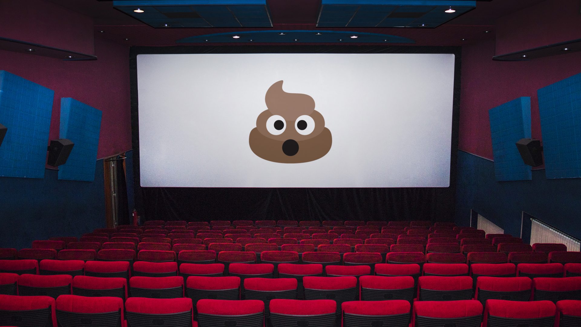 A photo of a movie theater with a big poop emoji placed on the screen