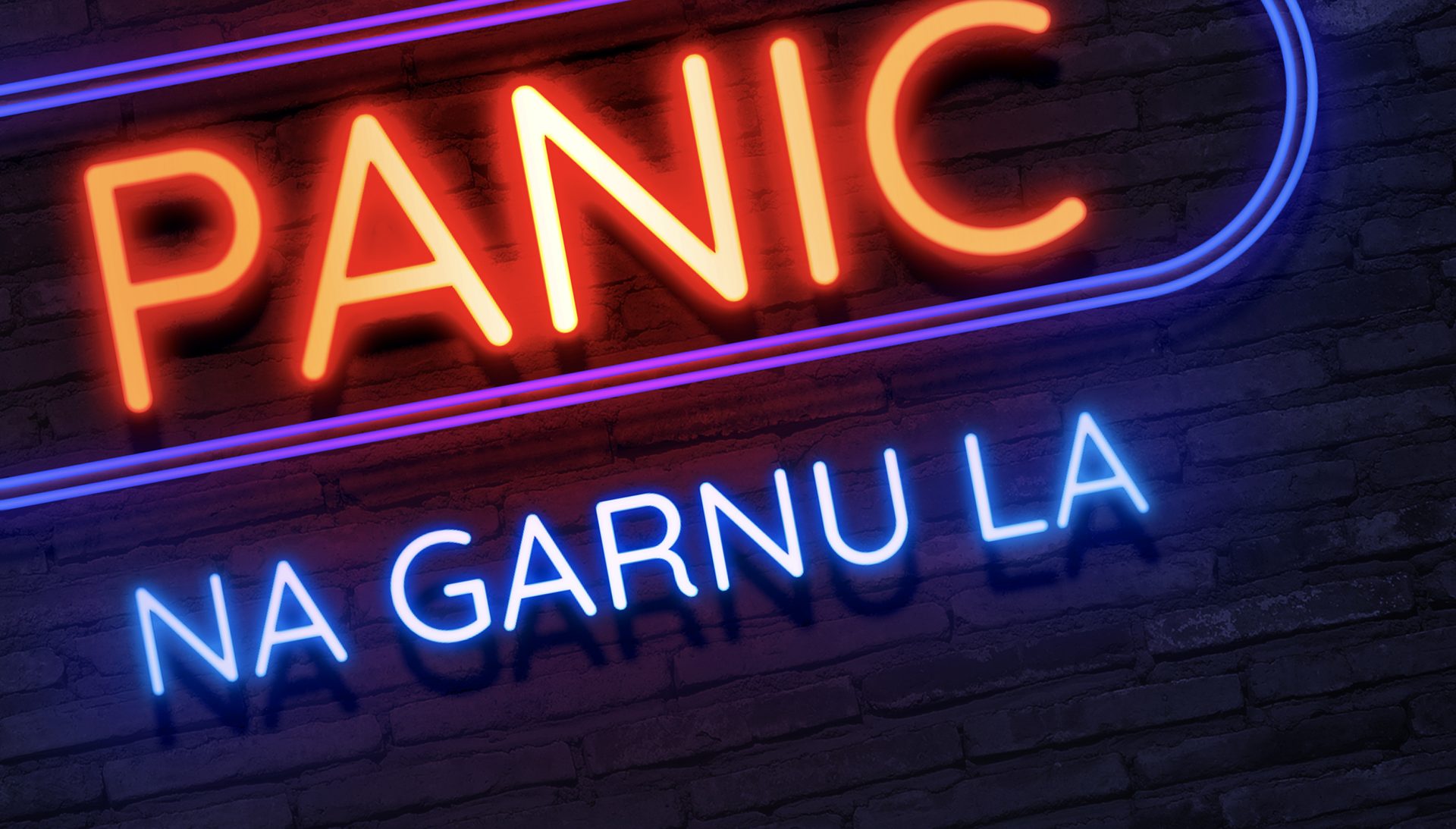 A neon sign that says "Panic Na Garnu La"